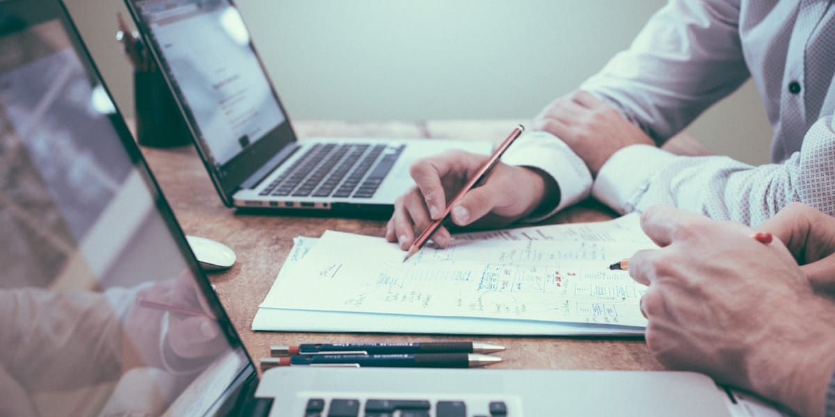 Business professional reviewing continuity planning documents